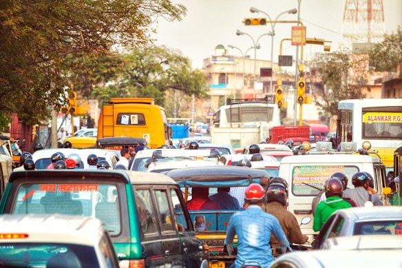 The deafening honking of horns, expected in the city, continues on the open road.