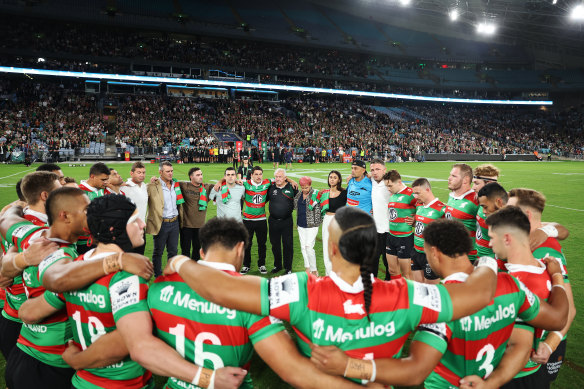 The Sattler family join the Rabbitohs’ team circle before the match against Manly.