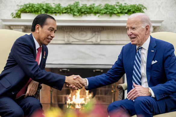 US President Joe Biden meets Indonesia’s President Joko Widodo in the Oval Office of the White House in Washington.