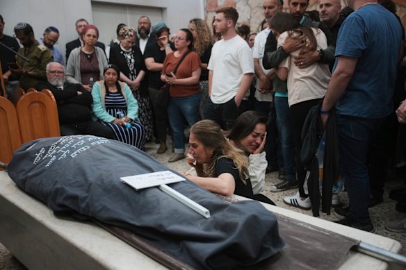 Mourners at the funeral of Tzeela Gez, an Israeli who was on her way to have her baby delivered when she was shot and killed in the occupied West Bank.