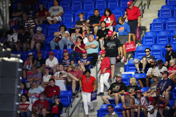 Attendees depart as Donald Trump speaks at the Atlanta rally.