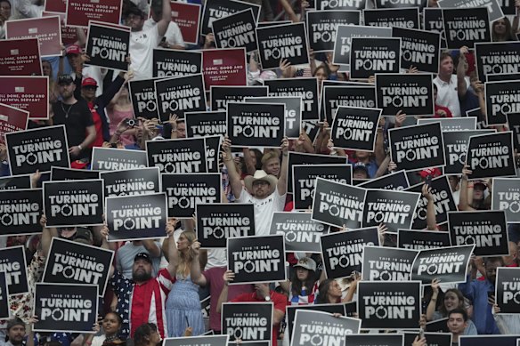 Supporters attend the memorial service on Sunday.