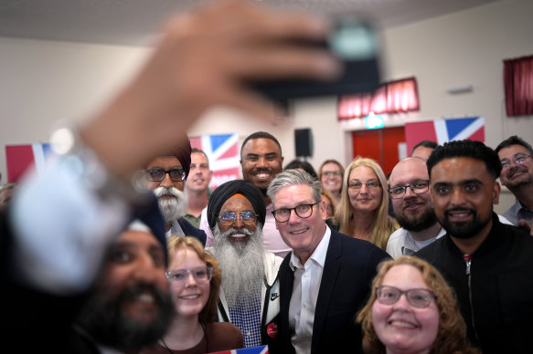 Keir Starmer with Labour supporters. “He’s a bit bland … but he’s finally ousted the crooked Conservatives.”