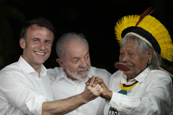 French President Emmanuel Macron, from left, Brazil’s President Luiz Inacio Lula da Silva and Chief Raoni Metuktire, in Brazil on Tuesday.