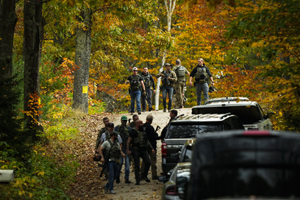 Police during their search in Durham, for Robert Card.