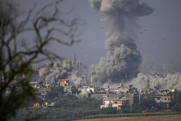 Smoke rises following an Israeli airstrike in the Gaza Strip, as seen from southern Israel, on Monday.