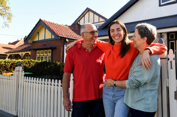 Hannah Rayment, 33, with her Baby Boomer parents John and Marea.