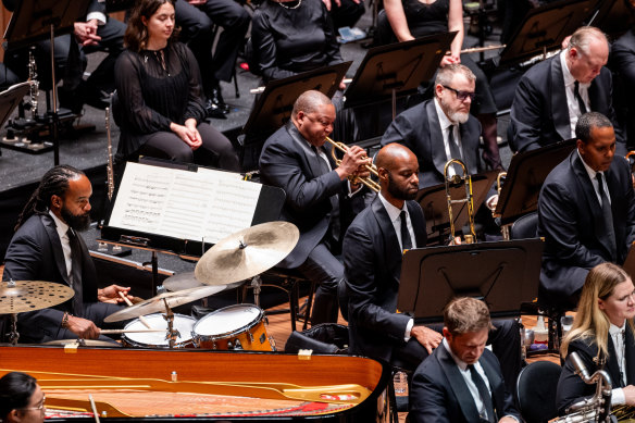 Composer Wynton Marsalis sat anonymously in the trumpet section.