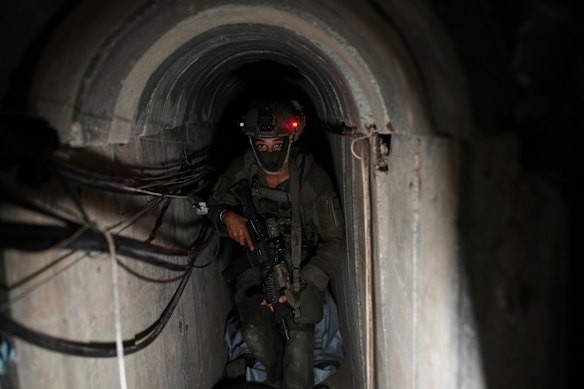 An Israeli soldier walks in a tunnel beneath the European Hospital in Khan Younis, southern Gaza.