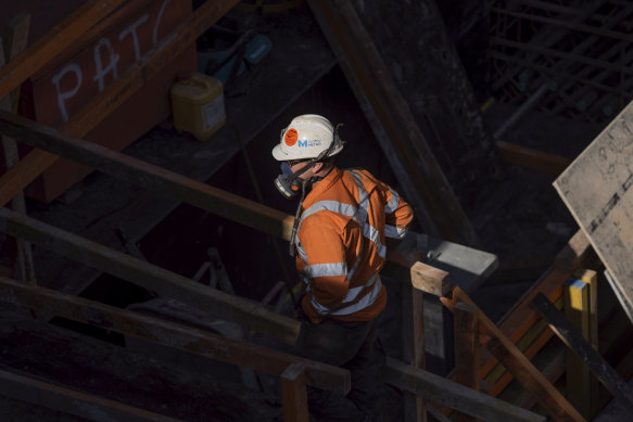 A worker in the Sydney Metro's 10 metre deep 'station box' at Central Station.
