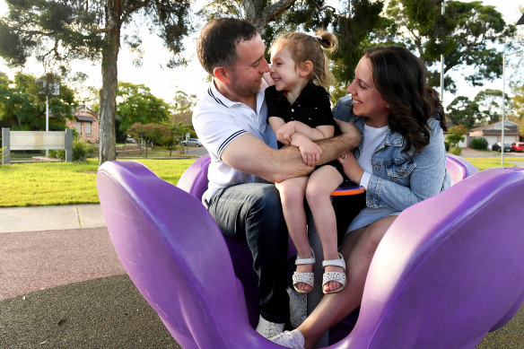Adam and Adriana Sharpe with their daughter Alessia, 3, who was the first baby to be diagnosed with SMA under the newborn screening program.
