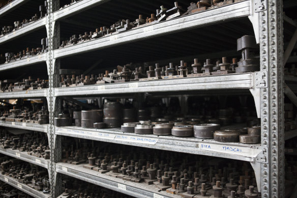 FIFA medal molds, samples and mechanic accessories from decades of works stored on metal shelves at the GDE Bertoni headquarters.