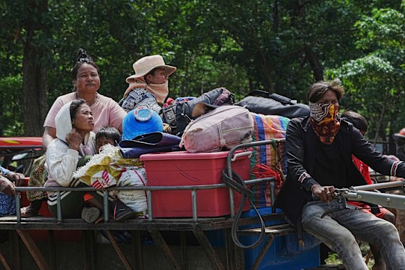 Cambodians take refuge in Wat Tham Kambar in Oddar Meanchey province, Cambodia, on Friday.