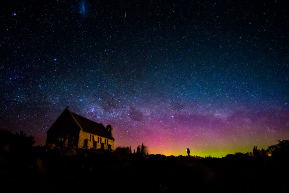 The southern lights photographed across Lake Tekapo in New Zealand.