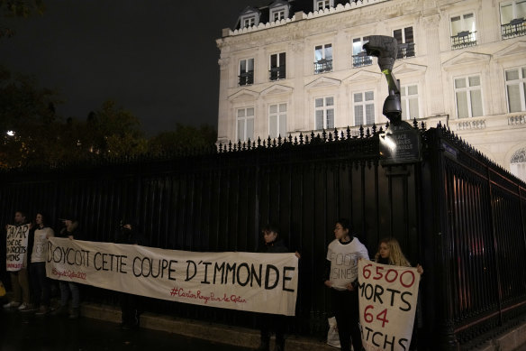 Activists protest the World Cup outside the Qatar embassy in Paris on November 15.