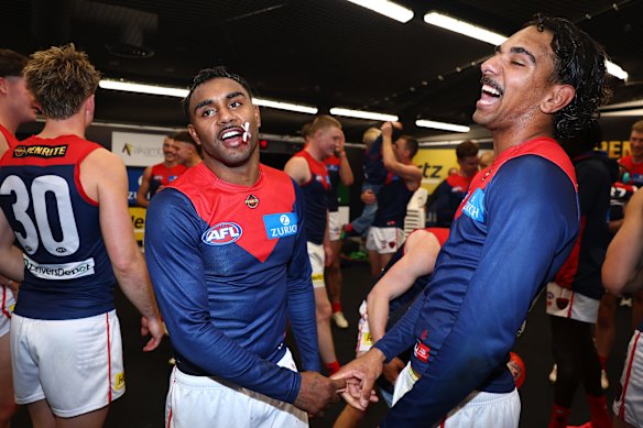 Kysaiah and Latrelle Pickett celebrating the victory after the Devils rolled the Kangaroos.