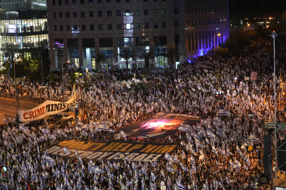 A protest in Tel Aviv on Saturday. Israel’s biggest cities have experienced some of the biggest protests in the nation’s history over recent months, even after Netanyahu announced he was pausing his planned changes.