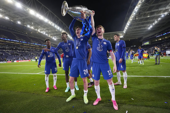 Kai Havertz and Timo Werner of Chelsea celebrate with the Champions League Trophy following their team’s victory last season.