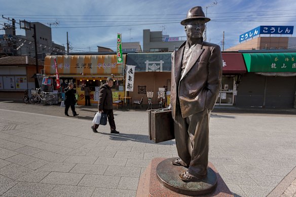 A statue of Tora-san outside Shibamata station, the town in which his films, hugely popular in Japan, were shot.