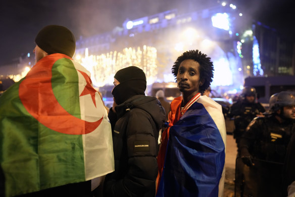 “We’re together”: French and Moroccan fans in Paris.