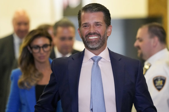 Donald Trump jnr steps out of court during a break in proceedings.