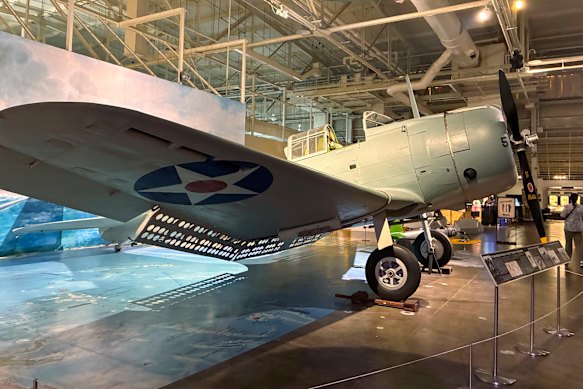 The Douglas SBD-2P Dauntless dive bomber, on display at the Pearl Harbor Aviation Museum. It was used in the Battle of the Coral Sea, which relieved the threat to the supply lines between the US and Australia. 