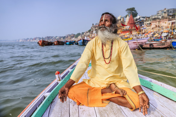 A sadhu or mystic on the Ganges, India.