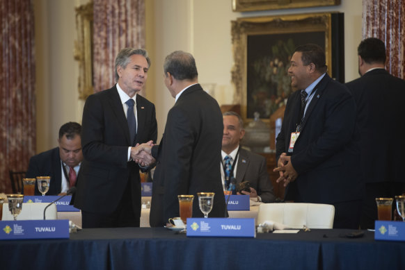 Secretary of State Antony Blinken (left) greets dignitaries from Pacific nations during the US-Pacific Island Country Summit at the State Department in Washington.