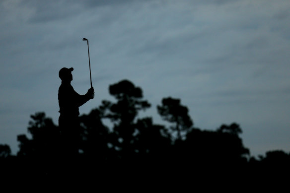 Tiger Woods tees off during a practice round at Augusta National.