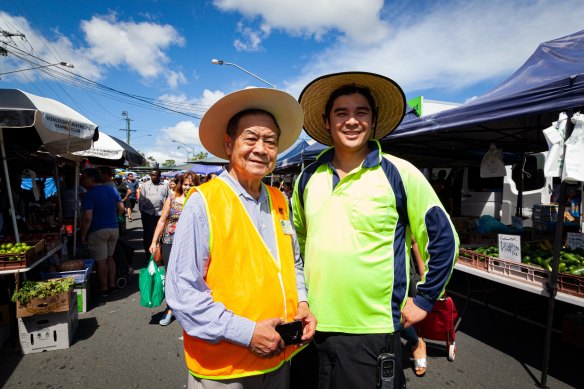 Dean Khieu (right) now runs the Global Food Markets Logan started by his father, Paul.