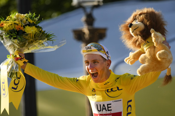 Tadej Pogacar celebrates his overall victory in last year’s Tour de France, his second consecutive win.