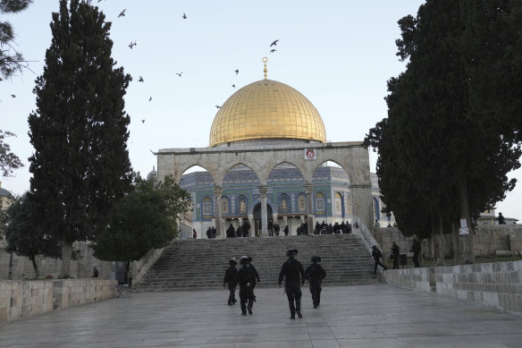 Israeli police are deployed at the Dome of the Rock Mosque in al-Aqsa compound following a raid at the site  in the Old City of Jerusalem on Wednesday.