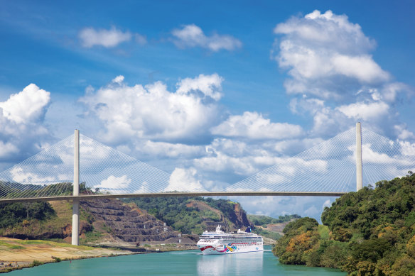 Norwegian Jewel passes beneath Centennial Bridge on the Panama Canal.