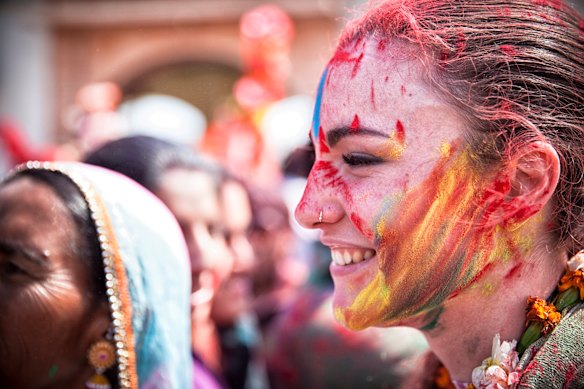 Holi is a celebration of spring with coloured powders thrown and painted on party-goers..