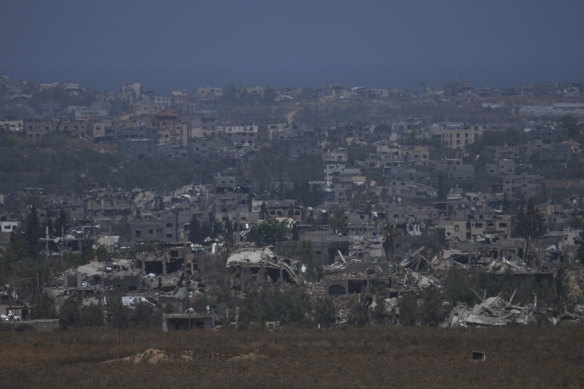Destroyed buildings in the Gaza Strip, as seen from southern Israel on Friday.