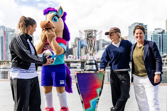 Barbieri with mascot Nara; musician G-flip, who will perform before the match; and ex-Matilda Sarah Walsh, now a member of the Asian Cup organising committee. 