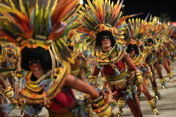 Performers from the Salgueiro samba school parade during Carnival celebrations at the Sambadrome in Rio de Janeiro.