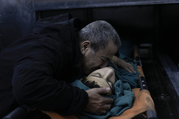 A relative mourns 15-year-old Basil Abu Al-Wafa, who was killed during an Israeli military raid on Jenin refugee camp in the West Bank on Wednesday.