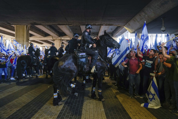 Mounted police disperse demonstrators trying to block the entrance to Israel’s main international airport.