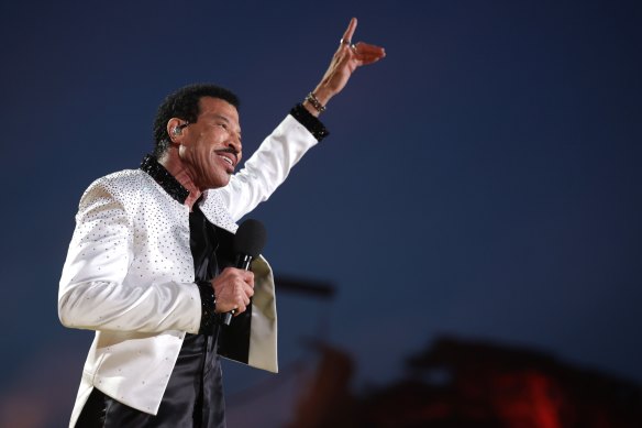 Everybody sing, everybody dance: Lionel Richie got the King moving on Sunday.