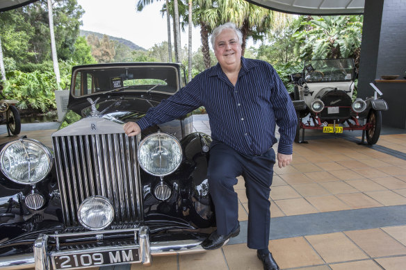 Clive Palmer at the Palmer Coolum Resort with a car from his vast car collection.