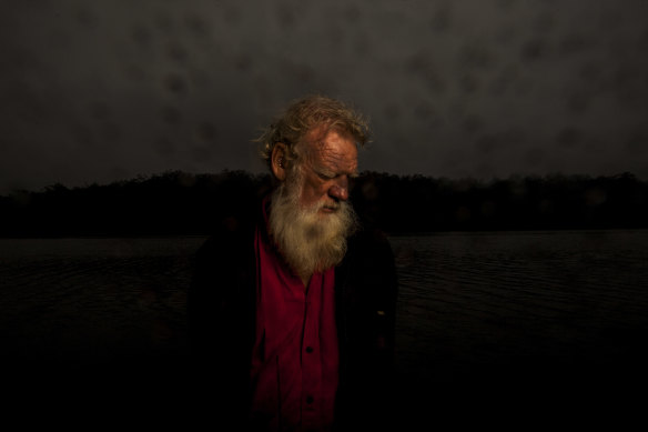 Bruce Pascoe at his property in Gipsy Point last month as bushfires ripped through the region.