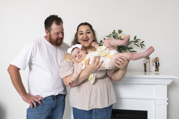 Rima and Sean Stoddart with their 10-month-old, Charlotte.