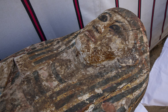 An ancient coffin that was unearthed in Saqqara, south of Cairo, in a vast necropolis filled with burial shafts, coffins and mummies dating back to the New Kingdom.