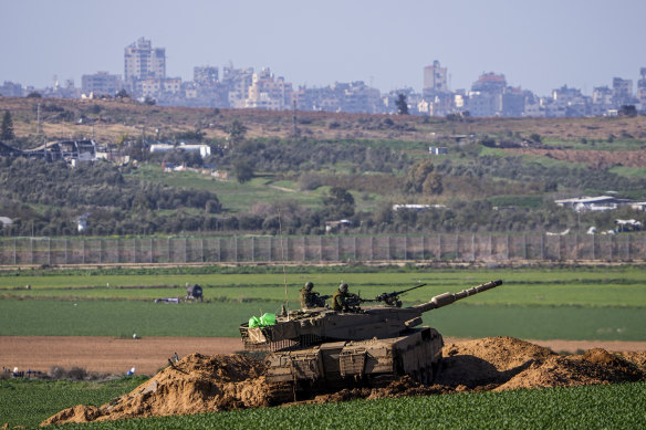 An Israeli tank in a position on the border with the Gaza Strip, as seen from southern Israel.