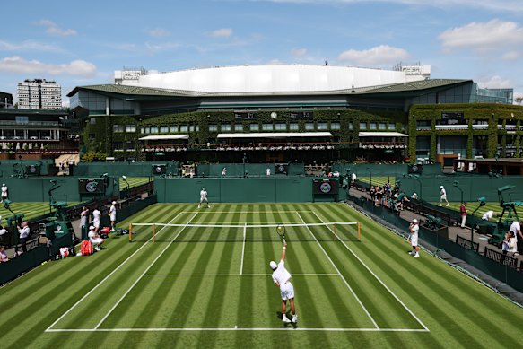 Alex de Minaur (bottom) during his preparation this week for Wimbledon.