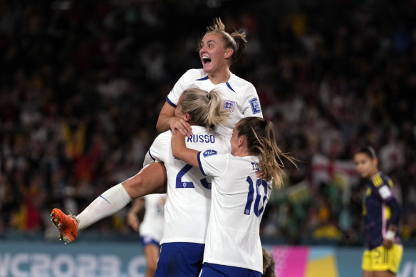 England’s Alessia Russo, centre, celebrates after scoring a second goal against Colombia in the World Cup quarter-final.