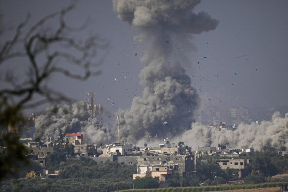 Smoke rises from an explosion following an Israeli airstrike in the Gaza Strip, as seen from southern Israel.