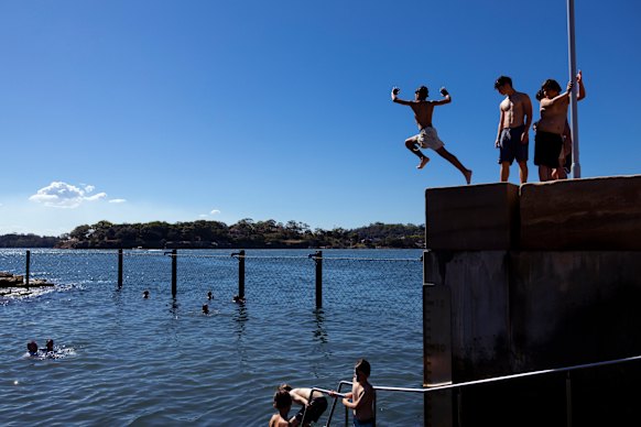 People are cooling off in Marrinawi Bay as the heat wave begins on Wednesday.