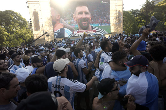 Argentina fans celebrate in the Palermo neighbourhood of Buenos Aires as their hero speaks.